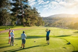 Golfers looking into the golf ball direction