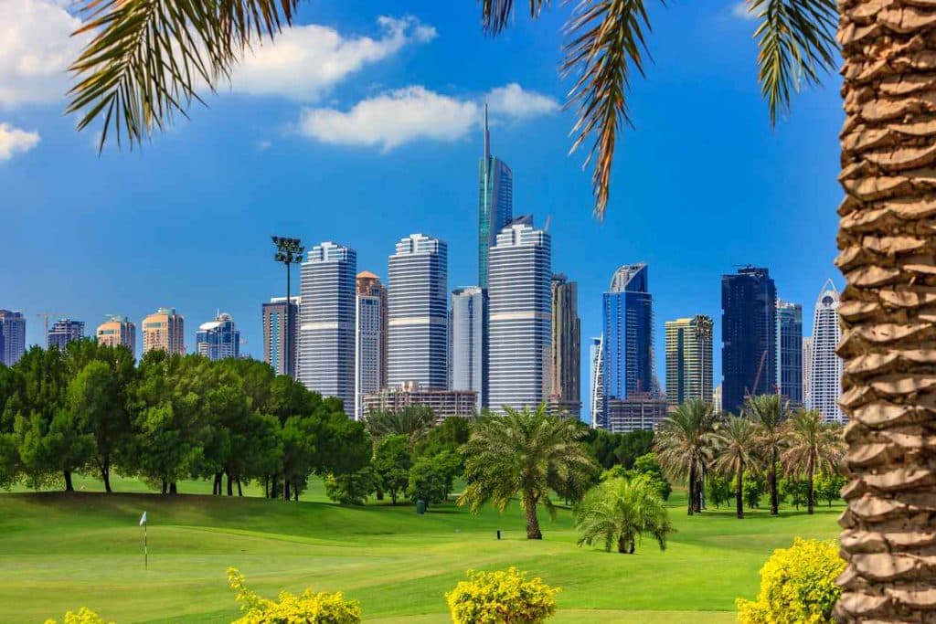 Golf Fairway In The Foreground; Modern Skyscrapers