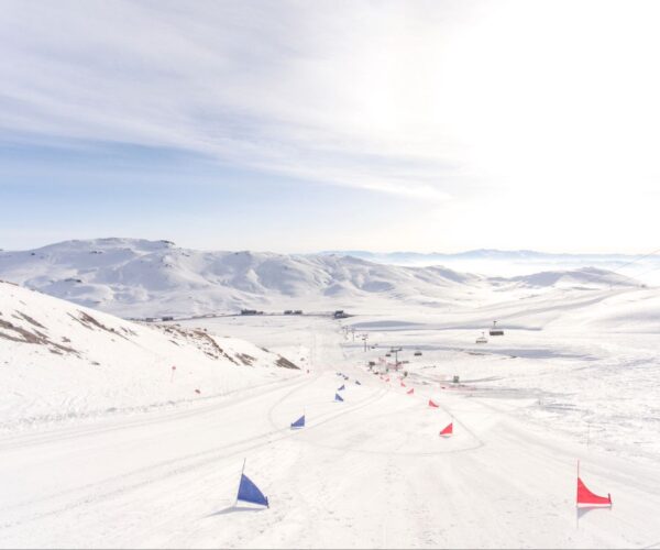 View of slalorm ski race course with mountains in the background