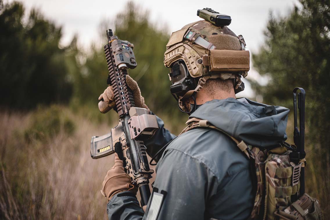 Man with airsoft geat and gun