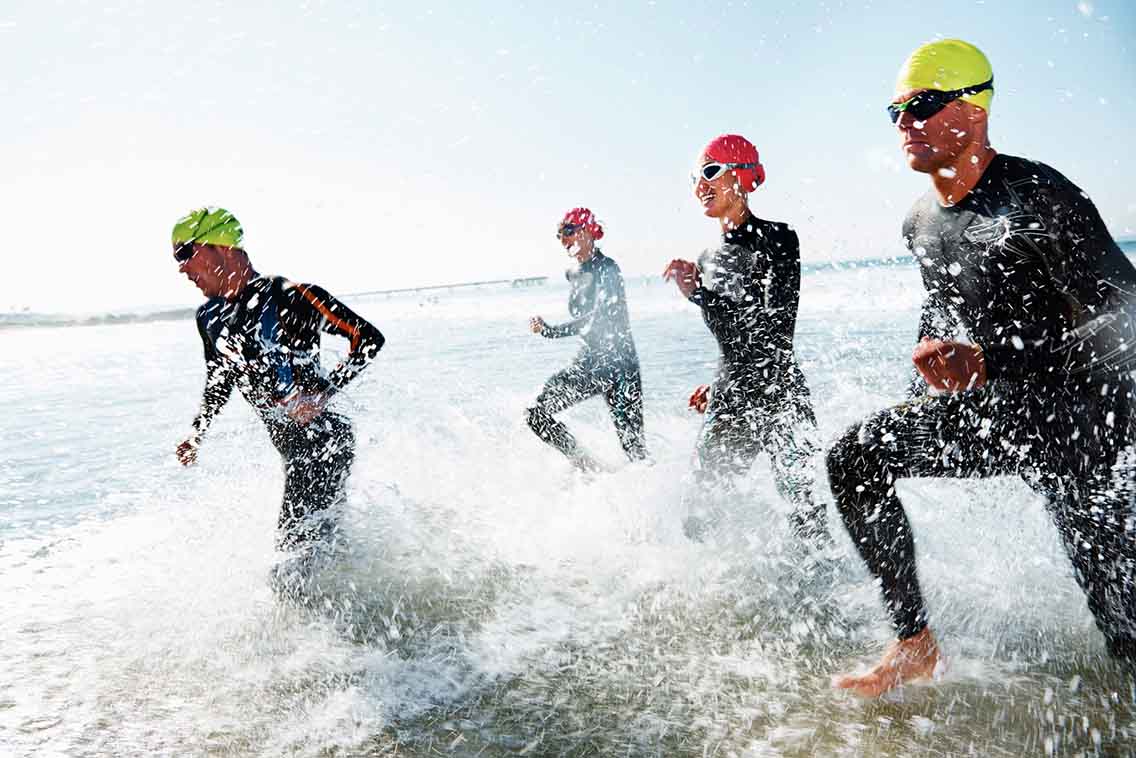 Group of event swimmers leaving water