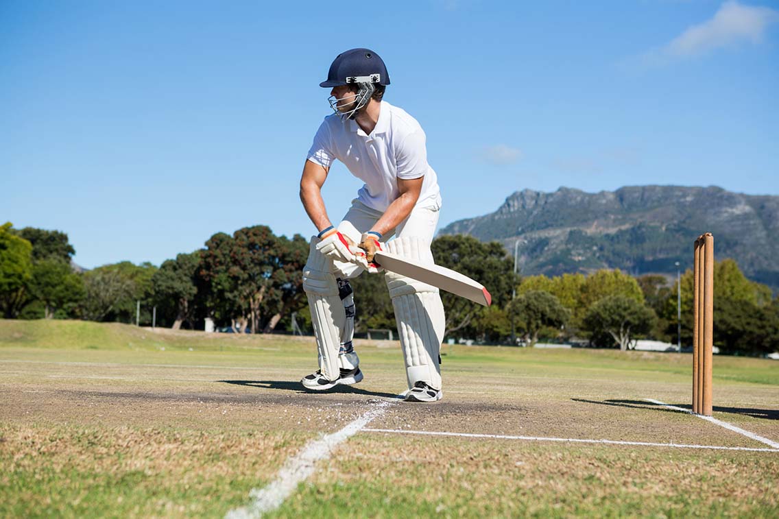 Man swinging to bat