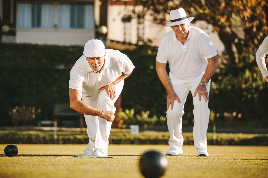 2 male players one throwing
