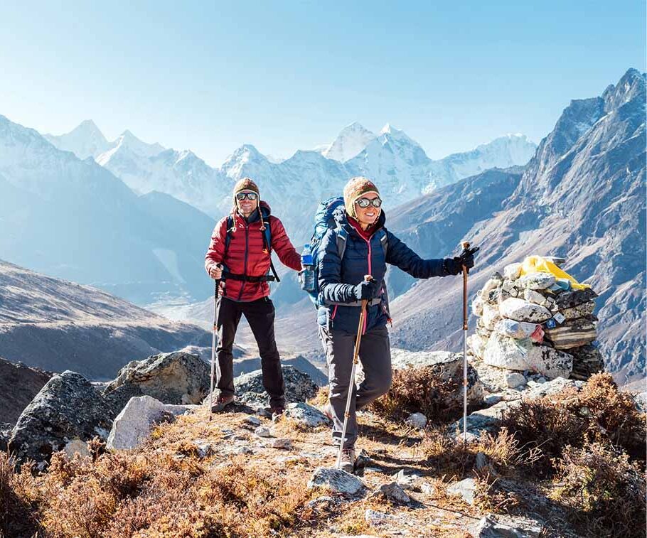Man and woman trekking in himalayas