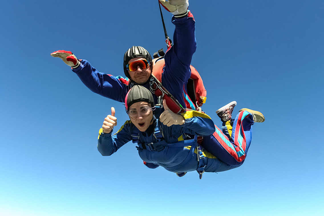 Tandem skydivers mid flight