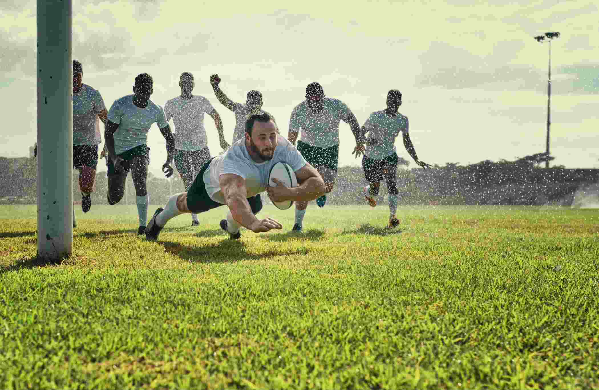 Rugby player scoring try