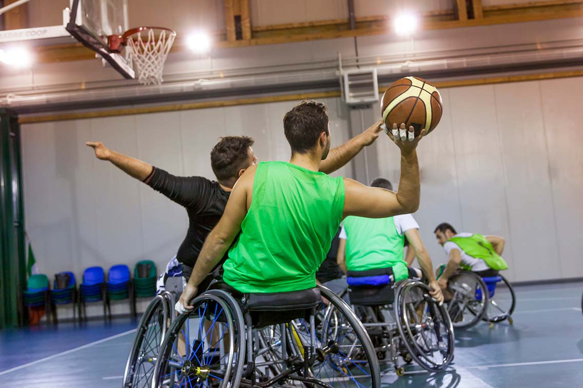 Wheelchair basketball player shooting