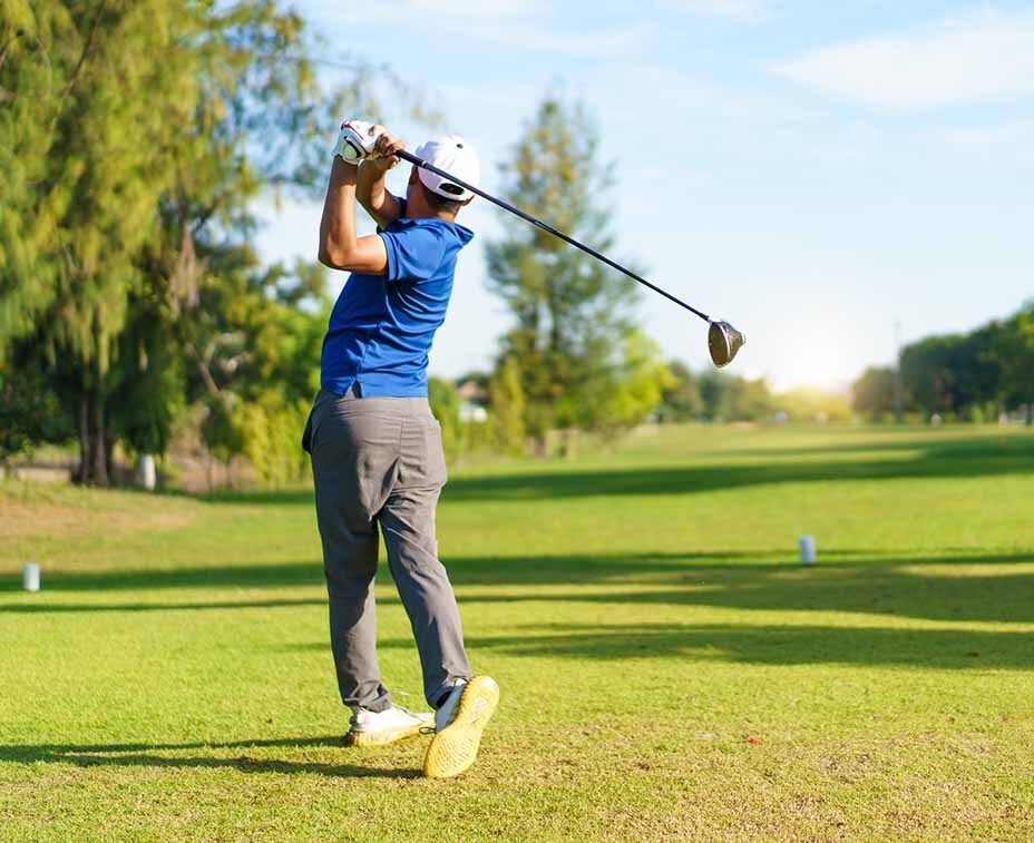 Golfer in driving shot
