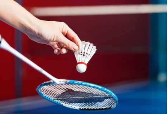 Woman playing Badminton