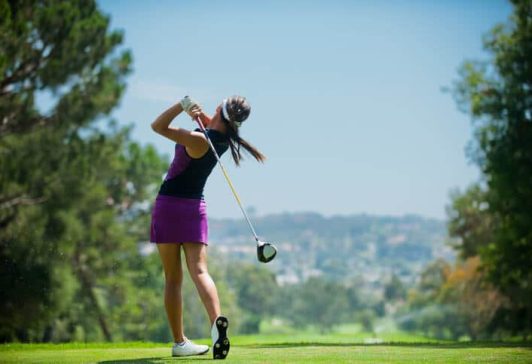 Female-Golfer What is golf insurance explained
