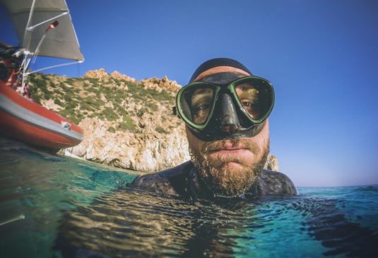 Free diver spearfishing selfie