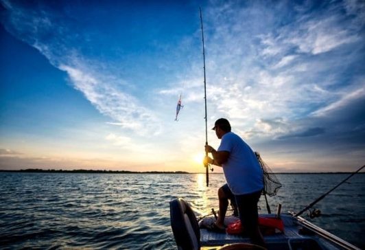 Man fishing at sea