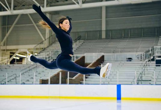 Ice skater jumping