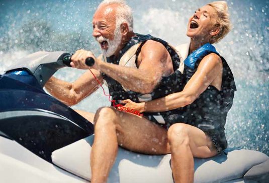 JetSkiing-BottomImage Older couple on a jet ski
