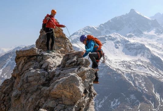 Two people mountaineering