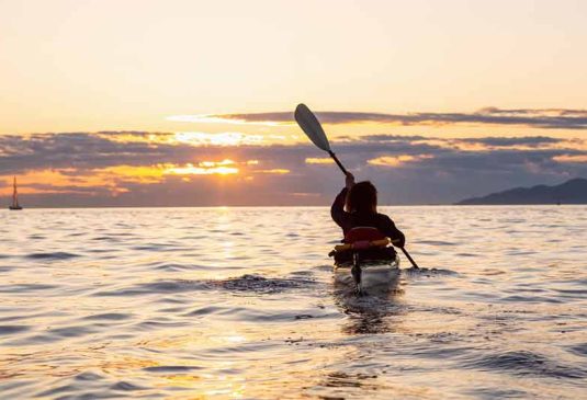 Sea kayaking at sunset