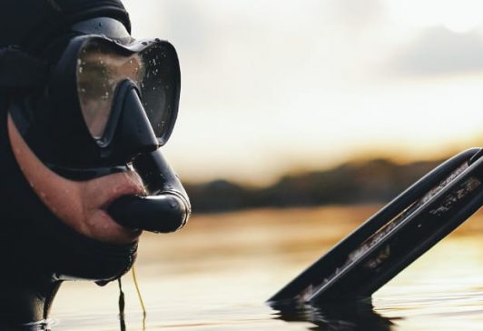 Key benefits Spearfishing Insurance Man with spearfishing gun