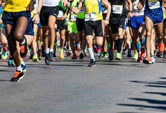 Sports Event Travel Insurance People running in an event