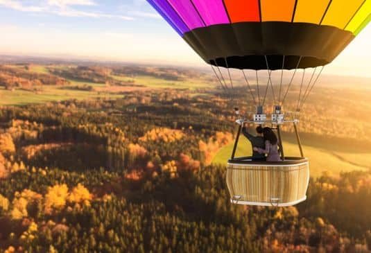 Hot air balloon with a loving couple