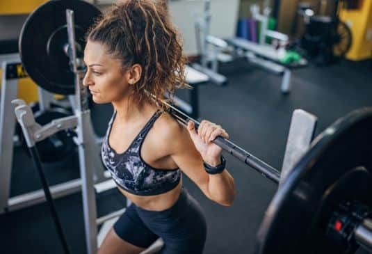 Woman exercising with weights