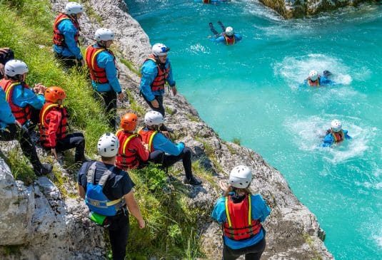 Why do you need Coasting Insurance A group of people coasteering in Wales