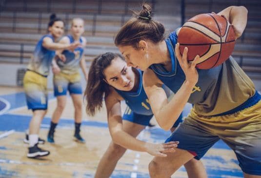 Girls playing basketball